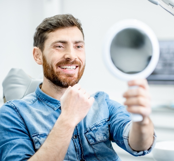 Man looking at smile after virtual smile design