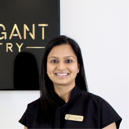 Doctor Pankti smiling in dental office