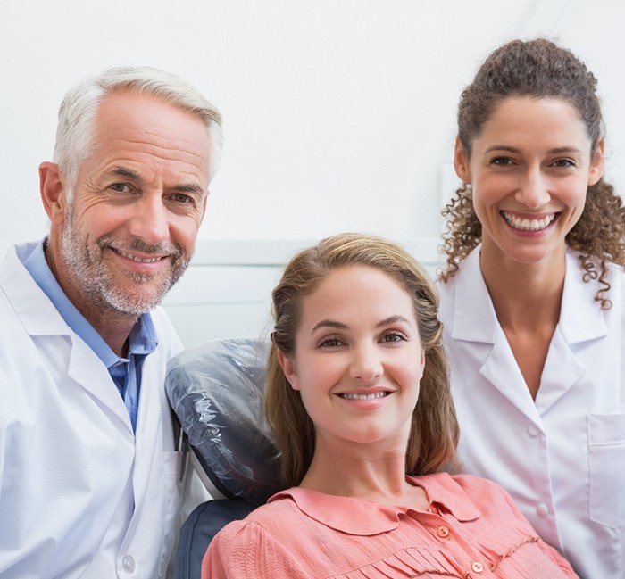 Female patient smiling in the dentist’s chair