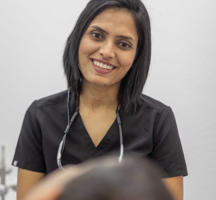 Dentistry patient smiling in dental chair