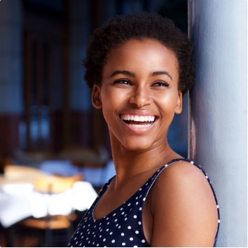 Woman with gorgeous smile after cosmetic dentistry