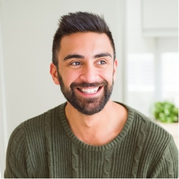 Man smiling after emergency dentistry