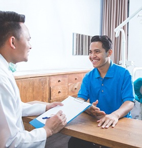 patient talking to dentist about financing options